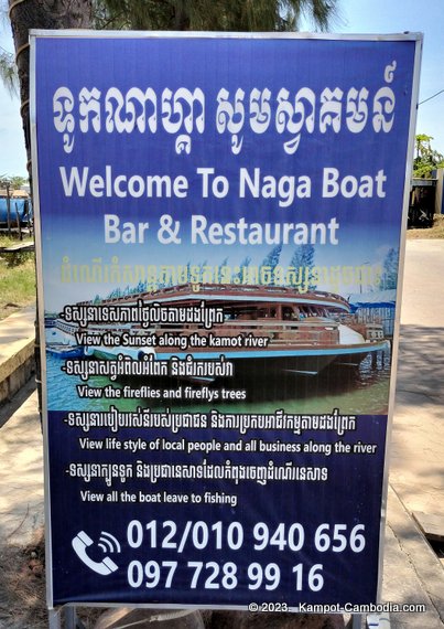 Sunset River Cruises and tourist boats in Kampot, Cambodia.