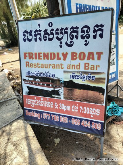 Sunset River Cruises and tourist boats in Kampot, Cambodia.